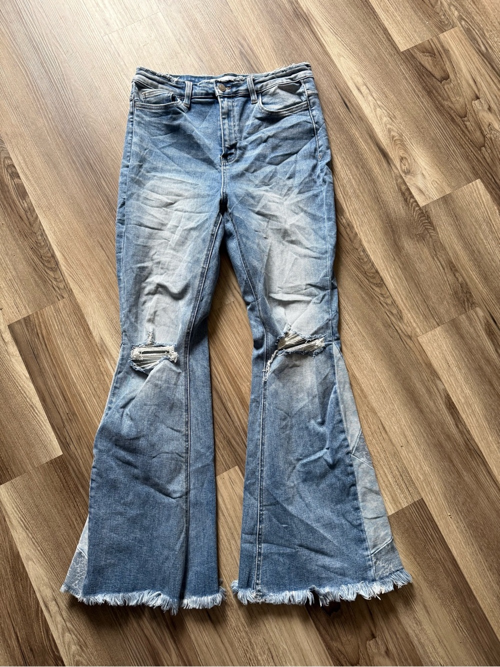 High-Rise Distressed Flare Jeans in Light Blue